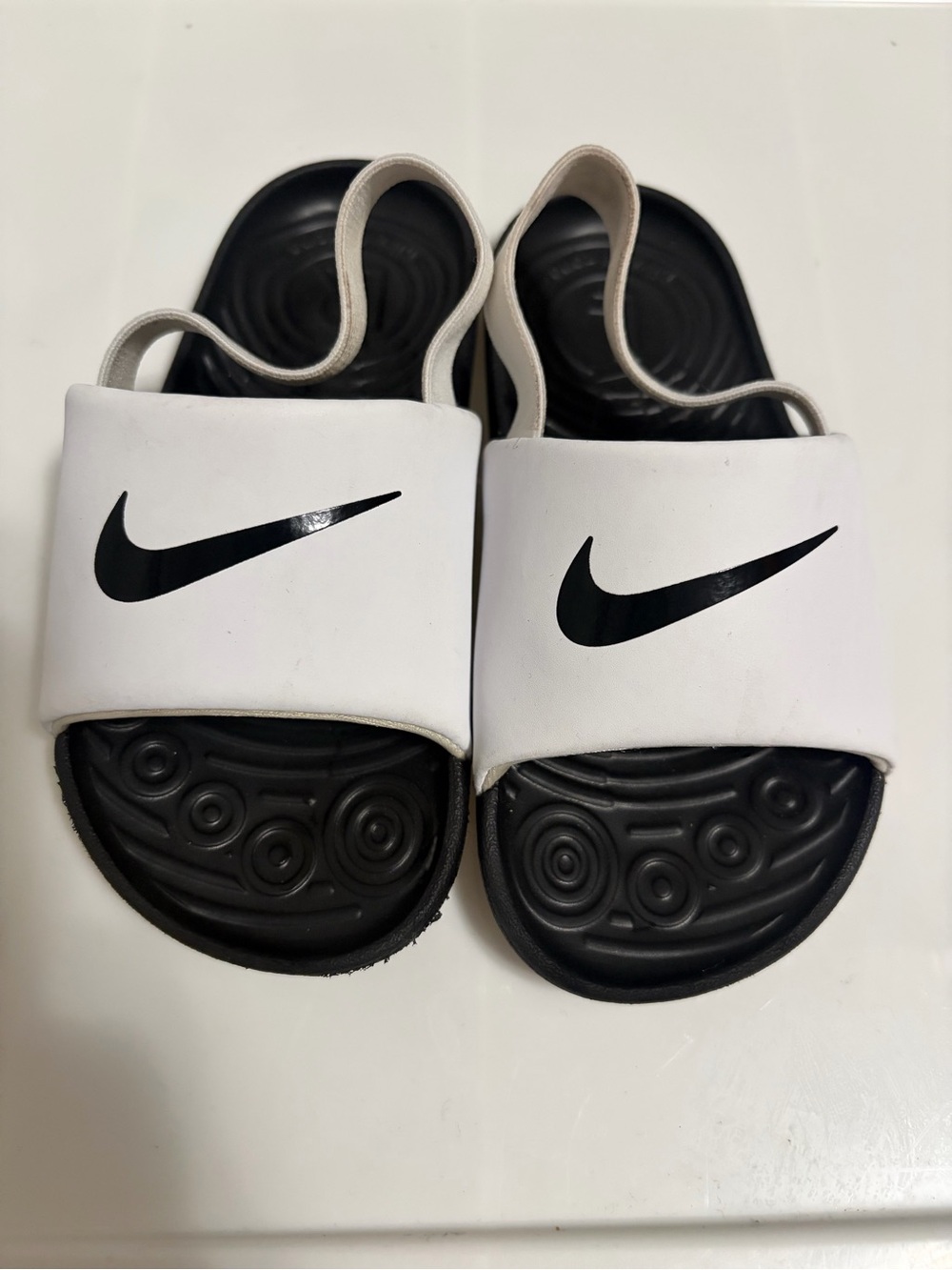 Nike White Strap Black Footbed Kids Slides with Swoosh